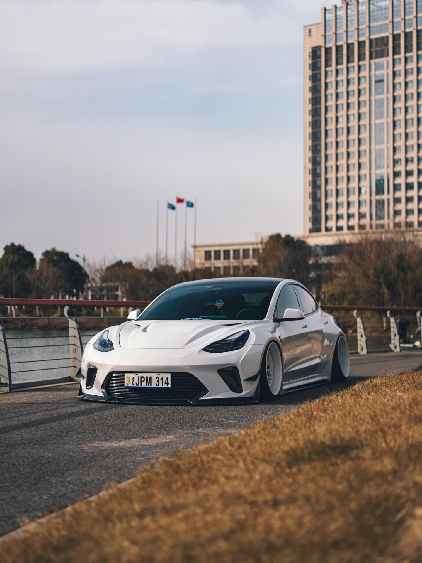 White Tesla Model 3 — Robot Craftsman HACKER Widebody