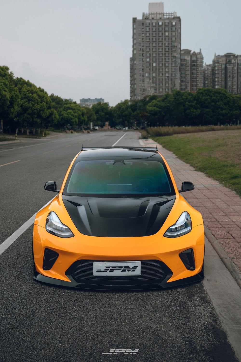Orange Tesla Model 3 — Robot Craftsman HACKER Widebody