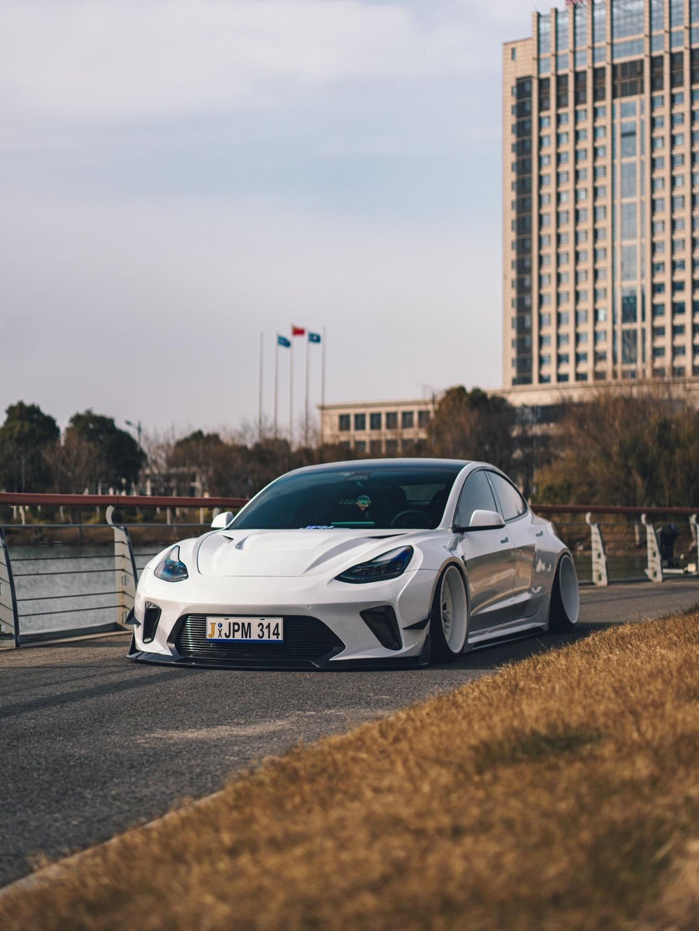 White Tesla Model 3 — Robot Craftsman HACKER Widebody