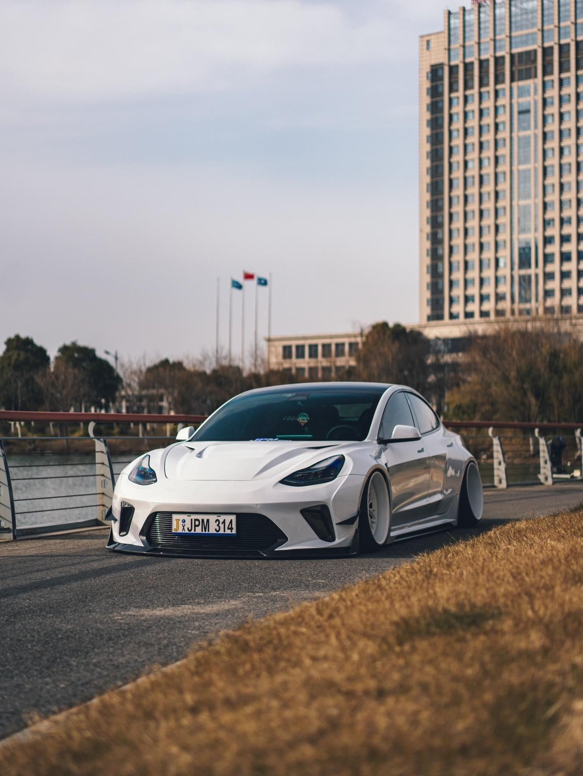 White Tesla Model 3 — Robot Craftsman HACKER Widebody