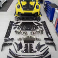 Porsche 992 GT3 RS Plastic OEM Dry-Carbon Replacement Kit Aftermarket Carbon Fiber Part / Bodykit - Robot Bodykits